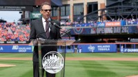 New York Mets radio broadcaster Howie Rose emcees the opening ceremonies before the Mets home opener against the Toronto Blue Jays at Citi Field.