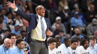 North Carolina Tar Heels head coach Hubert Davis yells down court Thursday, March 19, 2026, during the NCAA Men’s Basketball Tournament first round game against the VCU Rams at Bon Secours Wellness Arena in Greenville, South Carolina.