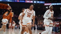 Texas Longhorns forward Madison Booker (35) celebrates a buzzer beater three point basket just before the end of the second quarter against the Mississippi Rebels at Moody Center.