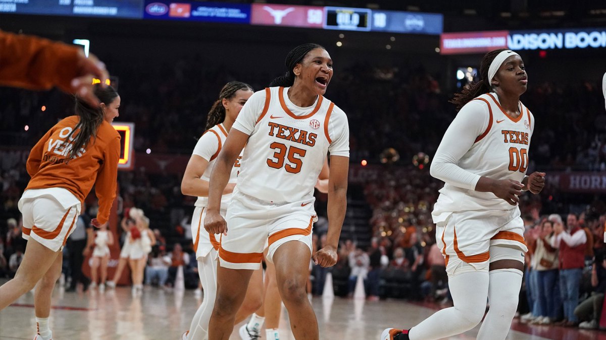 Texas Longhorns forward Madison Booker (35) celebrates a buzzer beater three point basket just before the end of the second quarter against the Mississippi Rebels at Moody Center.