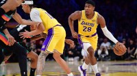Los Angeles Lakers forward Rui Hachimura (28) moves the ball against the San Antonio Spurs during the first half at Crypto.com Arena.