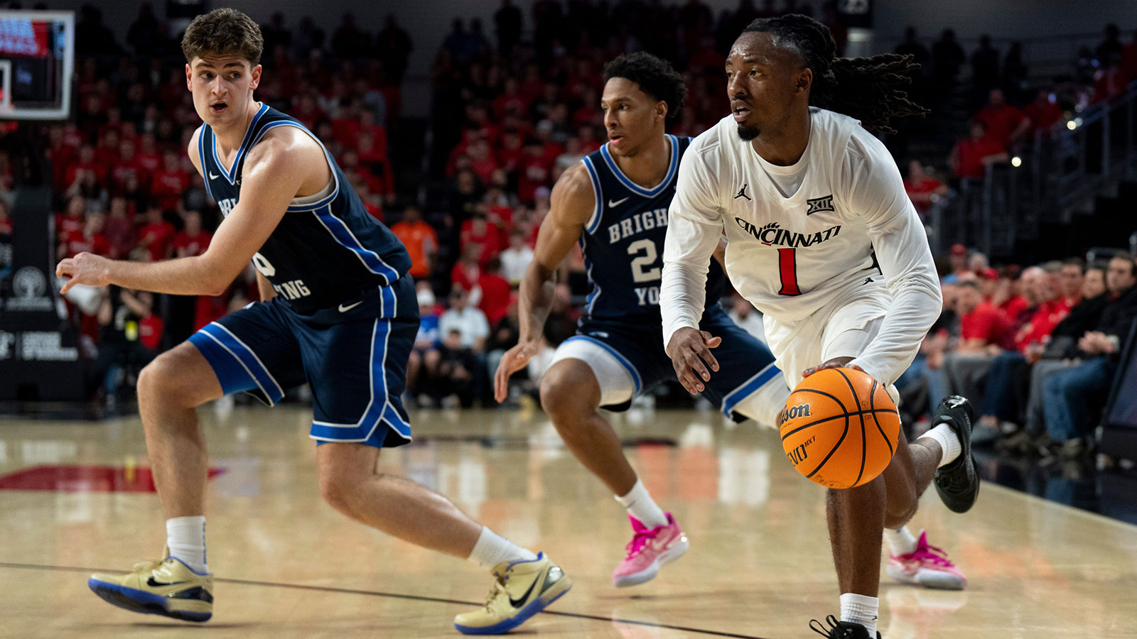 Cincinnati Bearcats guard Day Day Thomas (1) drives to the basket in the second half of the NCAA Basketball game against the BYU Cougars at Fifth Third Arena in Cincinnati on Tuesday, March 3, 2026.