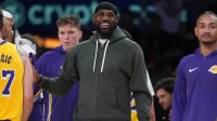 Los Angeles Lakers forward LeBron James watches from the bench against the Indiana Pacers at Crypto.com Arena.