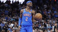 Oklahoma City Thunder guard Shai Gilgeous-Alexander (2) reacts after the Denver Nuggets score during the second quarter at Paycom Center.