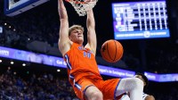 Florida Gators forward Thomas Haugh (10) dunks the ball during the first half against the Kentucky Wildcats at Rupp Arena at Central Bank Center.