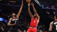 Los Angeles Clippers forward Kawhi Leonard (2) shoots the ball over Houston Rockets forward Kevin Durant (7) during the first quarter at Intuit Dome.
