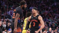New York Knicks guard Josh Hart (3) celebrates center Mitchell Robinson (23) in the third quarter at Madison Square Garden.