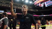 Southern California Trojans head coach Eric Musselman holds up Fight On sign after victory against the UTSA Roadrunners at the Galen Center.
