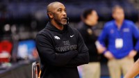 Hofstra Pride head coach Speedy Claxton looks on with a whistle during a practice session ahead of the first round of the men's 2026 NCAA Tournament at Benchmark International Arena.