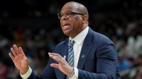 North Carolina Tar Heels head coach Hubert Davis instructs his team against the VCU Rams in the second half of a first round game of the men's 2026 NCAA Tournament at Bon Secours Wellness Arena.