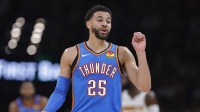 Oklahoma City Thunder guard Ajay Mitchell (25) talks to the bench after a play against the Denver Nuggets during the second quarter at Paycom Center.