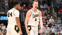 Purdue Boilermakers guard Fletcher Loyer (2) celebrates after a play during the first half against the Miami Hurricanes during a second round game of the men's 2026 NCAA Tournament at Enterprise Center.
