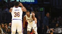 Los Angeles Lakers forward Rui Hachimura (28) passes the ball to guard Marcus Smart (36) against the Miami Heat during the first half at Crypto.com Arena.