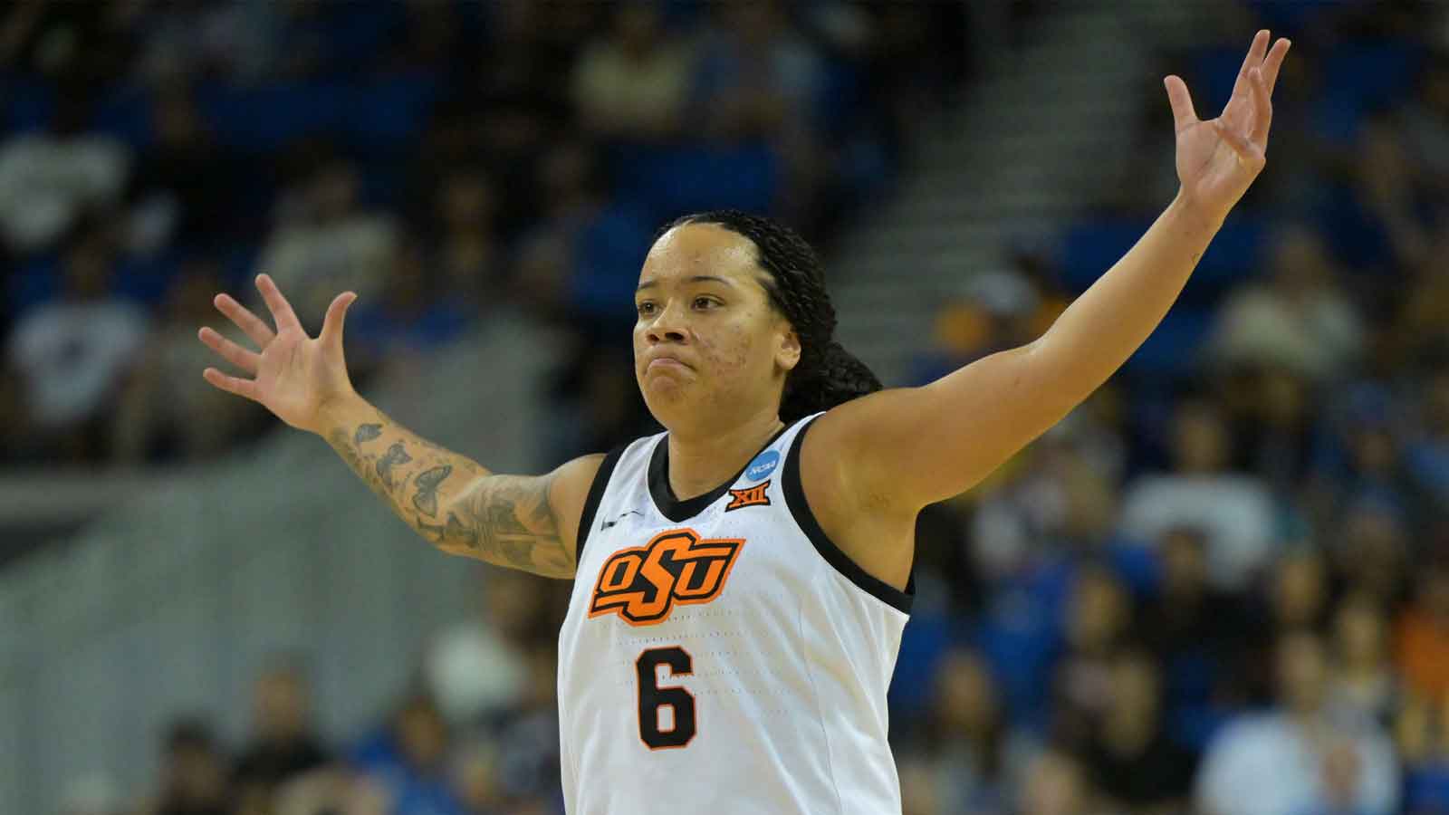 Oklahoma State Cowboys guard Jadyn Wooten (6) reacts after a three point basket in the second half against the Princeton Tigers at Pauley Pavilion.