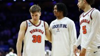 Virginia Cavaliers guard Dallin Hall (30) reacts against the Tennessee Volunteers in the second half during a second round game of the men's 2026 NCAA Tournament at Xfinity Mobile Arena.