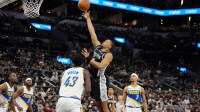 San Antonio Spurs forward Keldon Johnson (3) shoots over Indiana Pacers forward Pascal Siakam (43) in the second half at Frost Bank Center.