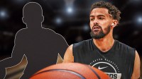 Trae Young next to silhouette