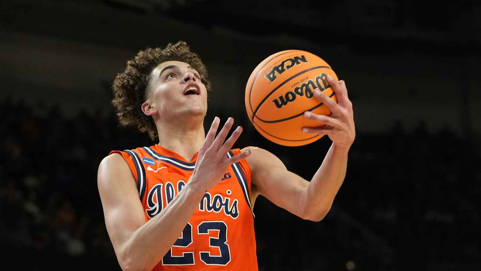 Illinois Fighting Illini guard Keaton Wagler (23) shoots in the first half during a second round game of the men's 2026 NCAA Tournament at Bon Secours Wellness Arena.