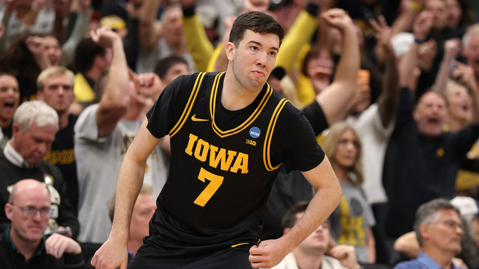 Iowa Hawkeyes forward Alvaro Folgueiras (7) makes a go-ahead three-point basket against the Florida Gators late in the second half during a second round game of the men's 2026 NCAA Tournament at Benchmark International Arena.