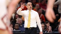Iowa Hawkeyes head coach Ben McCollum looks on in the second half against the Illinois Fighting Illini during an Elite Eight game of the South Regional of the men's 2026 NCAA Tournament at Toyota Center.