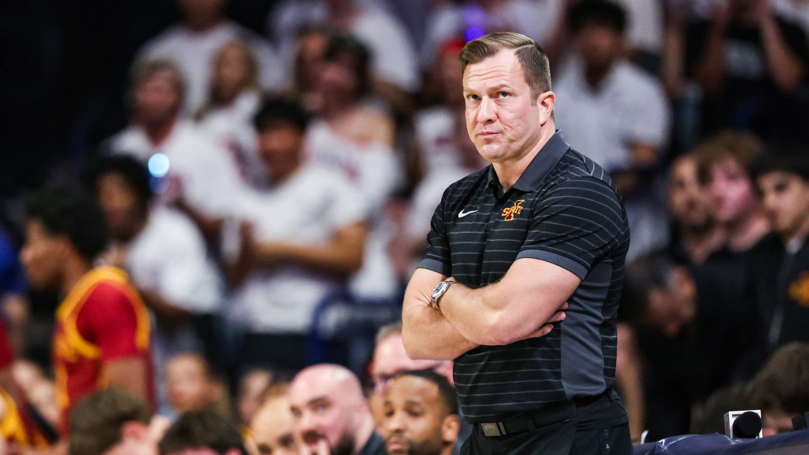 Iowa State Cyclones head coach T.J. Otzelberger looks up at the scoreboard during the first half of the game against the Arizona Wildcats at McKale Memorial Center.