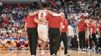 Iowa State Cyclones forward Joshua Jefferson (5) is helped off of the court after suffering an apparent injury to his left leg against Tennessee State Tigers during the first half of a first round game of the men's 2026 NCAA Tournament at Enterprise Center.