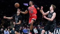 Chicago Bulls guard Jaden Ivey (31) is fouled by Brooklyn Nets guard Nolan Traore (88) during the first quarter at Barclays Center