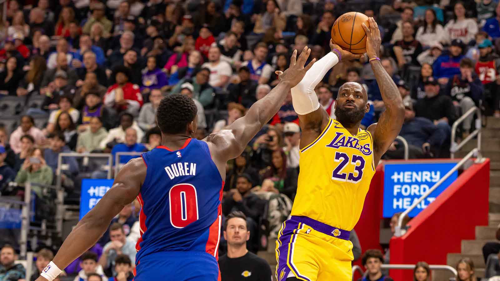 Los Angeles Lakers LeBron James (23) shoots a jump shot over Detroit Pistons Jalen Duren (0) during the first quarter at Little Caesars Arena.