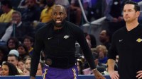 Los Angeles Lakers forward LeBron James (23) coaches his team with Los Angeles Lakers head coach JJ Redick as he waits to enter the game against the Golden State Warriors in the third period at Chase Center. Mandatory Credit: David Gonzales-Imagn Images