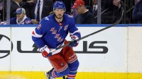 New York Rangers left wing J.T. Miller (8) skates against the Columbus Blue Jackets during overtime at Madison Square Garden.