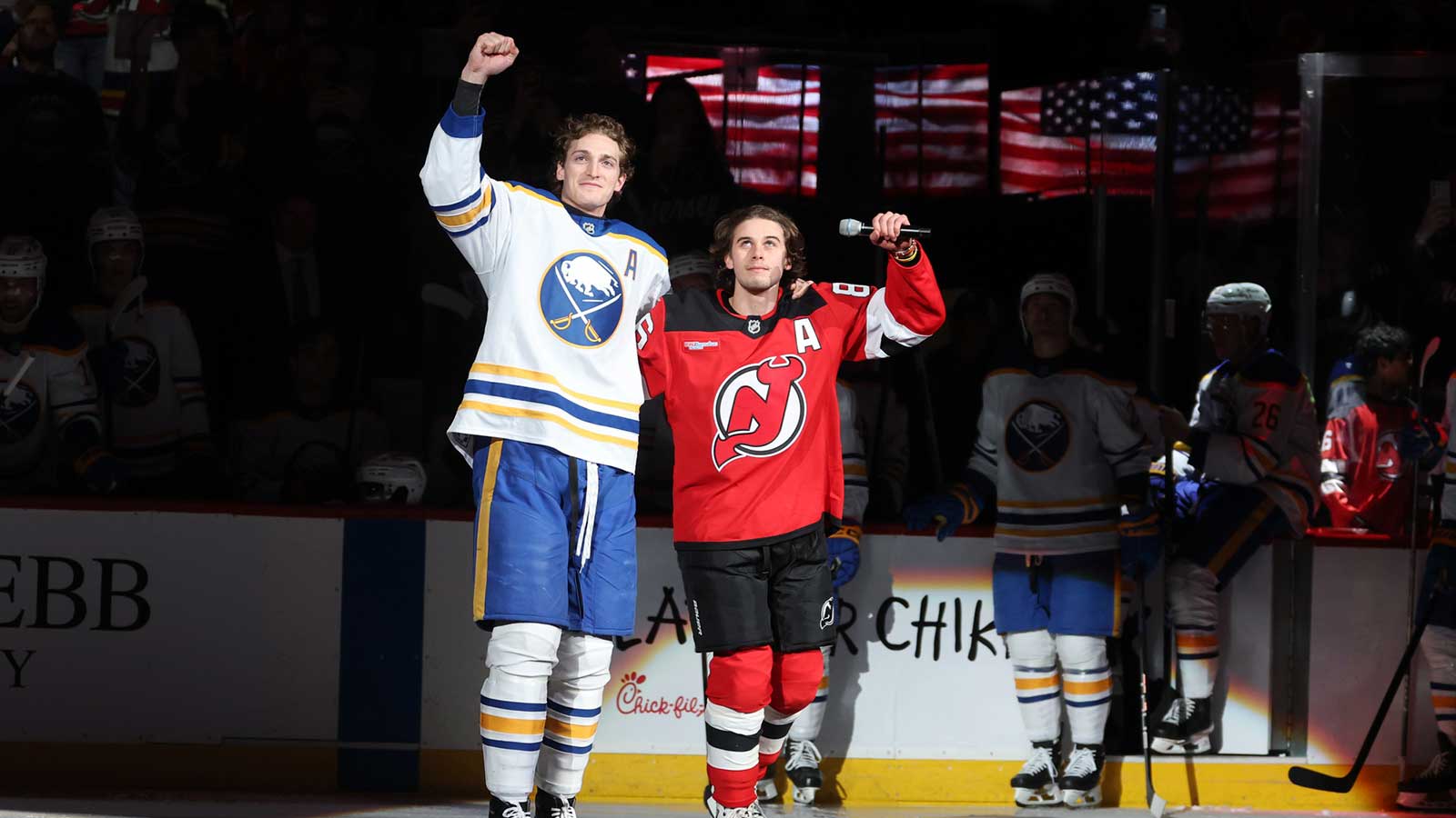 New Jersey Devils center Jack Hughes (86) and Buffalo Sabres center Tage Thompson (72) take a lap on the ice prior to the start of their game at Prudential Center. The two were teammates for the gold medal winning Team USA men’s ice hockey team at the 2026 Milan Olympics.
