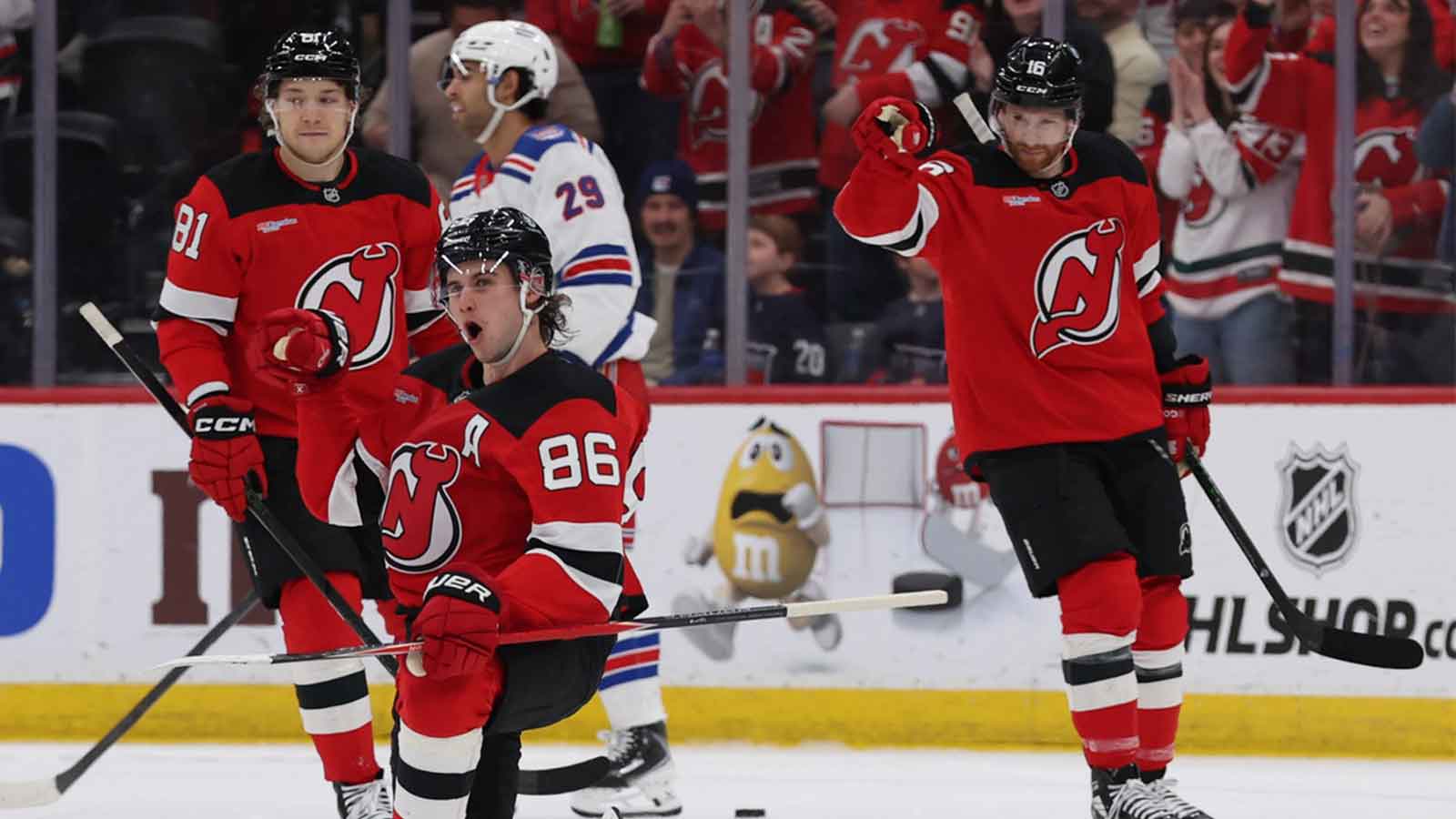 New Jersey Devils center Jack Hughes (86) celebrates his goal against the New York Rangers during the third period at Prudential Center.