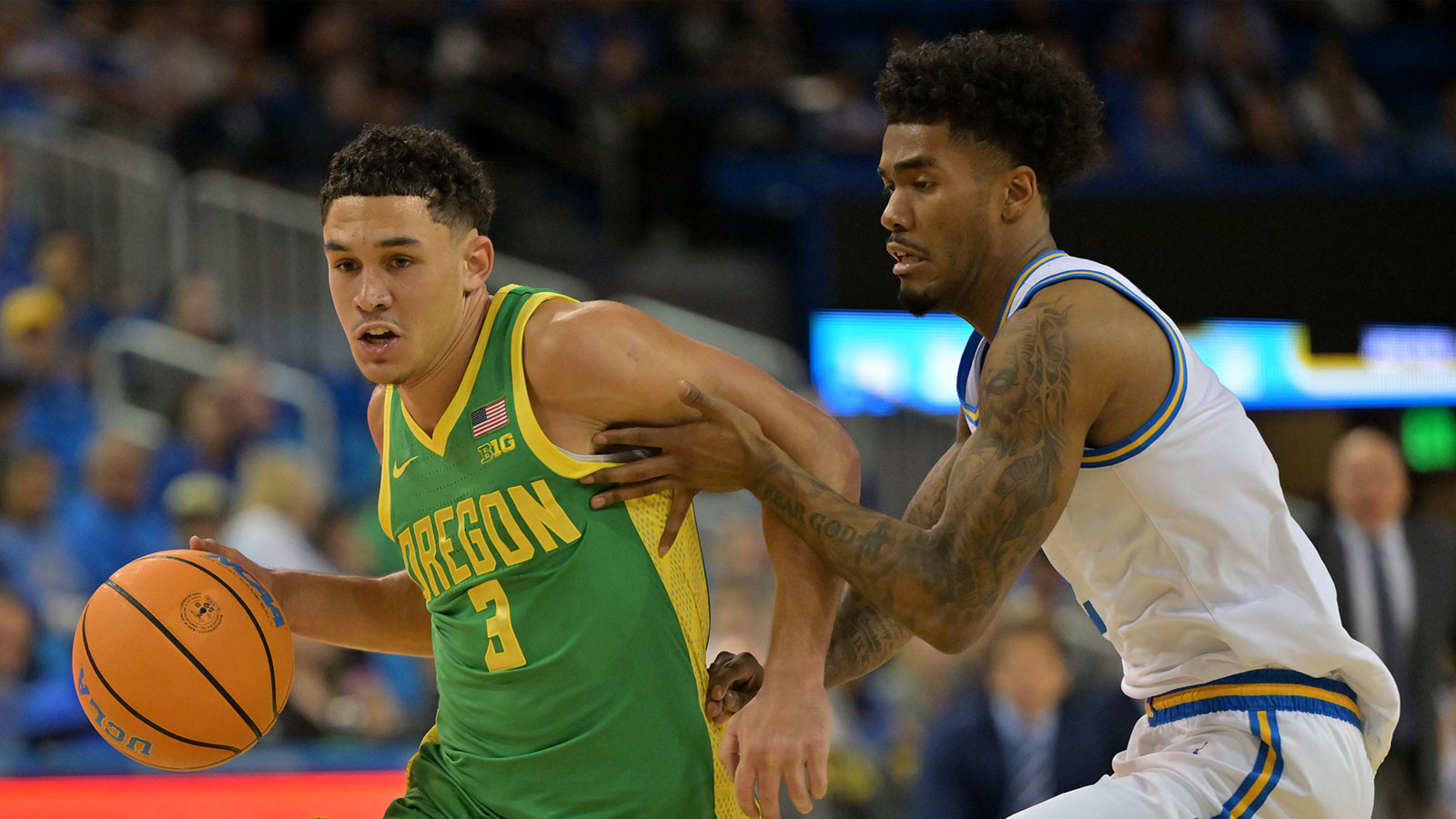 UCLA Bruins guard Donovan Dent (2) guards Oregon Ducks guard Jackson Shelstad (3) during the second half at Pauley Pavilion presented by Wescom Financial.