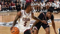 Chris Terrell brings the ball up the court during Thursday night's game against Jacksonville State at the Pan Am Center.