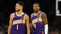 Phoenix Suns guard Devin Booker (1) and guard Jalen Green (4) against the Denver Nuggets at Mortgage Matchup Center.