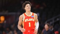 Atlanta Hawks forward Jalen Johnson (1) reacts after a shot against the Milwaukee Bucks in the first quarter at State Farm Arena.