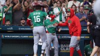Mexico outfielder Jarren Duran (16) celebrates a home run in the eighth inning against the United States at Daikin Park.