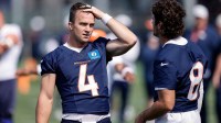 Denver Broncos quarterback Sam Ehlinger (4) and quarterback Jarrett Stidham (8) during Denver Broncos Training Camp.