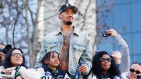 Seattle Seahawks wide receiver Jaxon Smith-Njigba (11) looks on during the Super Bowl LX parade.