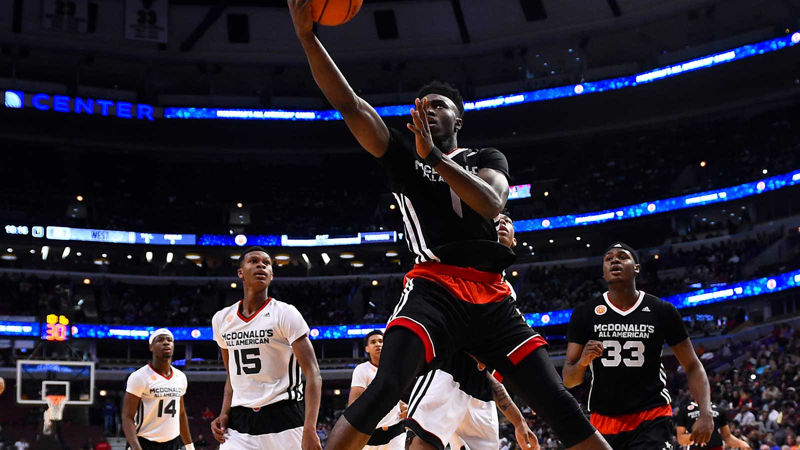 McDonald's All American East forward Jaylen Brown (1) shoots the ball against the McDonald's All American West during the first half at the United Center.