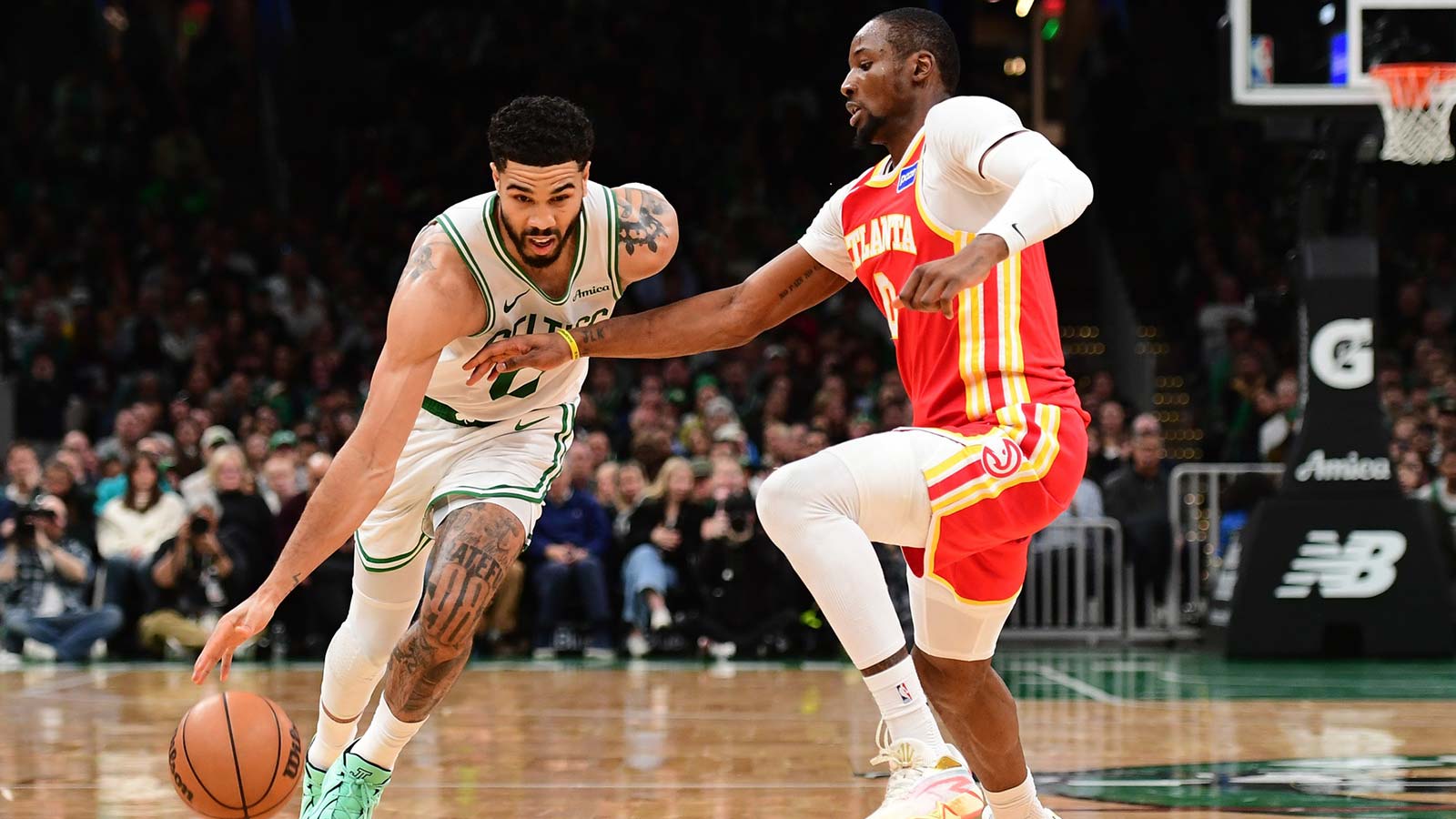 Boston Celtics forward Jayson Tatum (0) drives against Atlanta Hawks forward Jonathan Kuminga (0) during the second half at TD Garden.