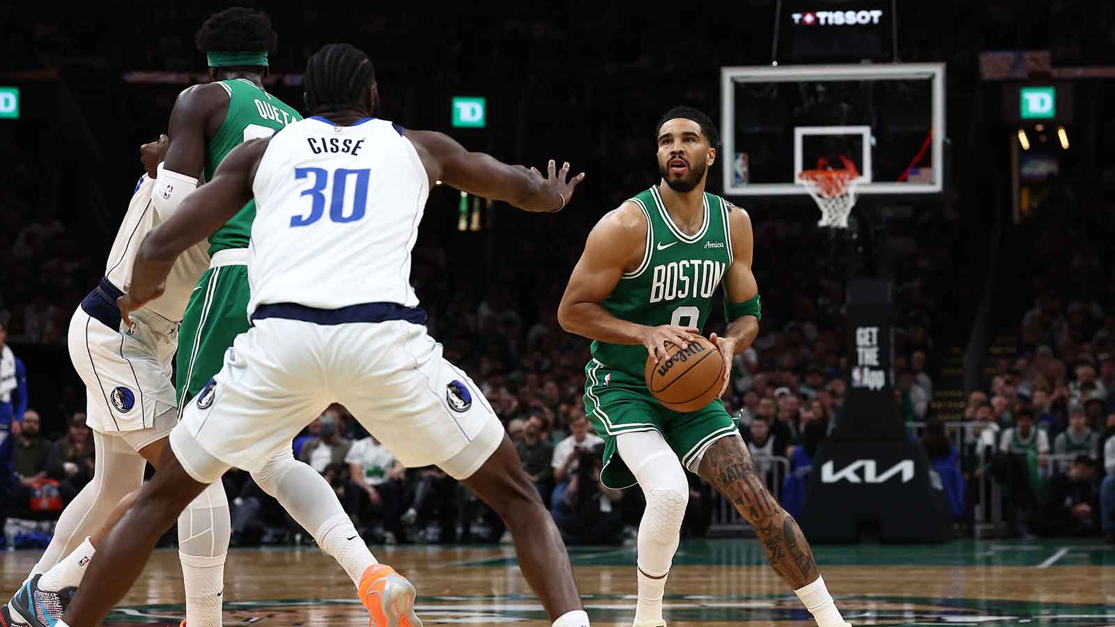 Boston Celtics forward Jayson Tatum (0) looks to shoot during the first quarter against the Dallas Mavericks at TD Garden.