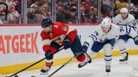 Florida Panthers defenseman Jeff Petry (2) moves the puck against Toronto Maple Leafs center Bobby McMann (74) during the second period at Amerant Bank Arena.