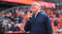 Former Syracuse Orange head coach Jim Boeheim speaks to the crowd after a ceremony to honor him after a game at the JMA Wireless Dome.