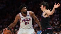 Philadelphia 76ers center Joel Embiid (21) drives to the basket against Miami Heat forward Jaime Jaquez Jr. (11) during the third quarter at Kaseya Center.