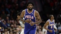 Mar 28, 2026; Charlotte, North Carolina, USA; Philadelphia 76ers center/forward Joel Embiid (21) runs down the court during the fourth quarter against the Charlotte Hornets at Spectrum Center. Mandatory Credit: Brian Westerholt-Imagn Images