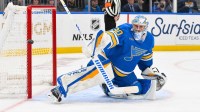 St. Louis Blues goaltender Joel Hofer (30) defends the net against the Los Angeles Kings during the first period at Enterprise Center.