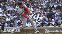Washington Nationals left fielder Joey Wiemer (21) hits a three-run home run during the first inning against the Chicago Cubs at Wrigley Field