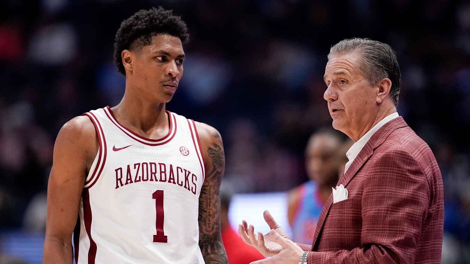 Arkansas coach John Calipari works with guard Meleek Thomas (1) during the second half of a SEC tournament semifinal game against Mississippi at Bridgestone Arena in Nashville, Tenn., Saturday, March 14, 2026.
