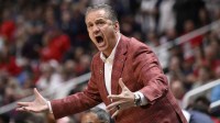 Arkansas Razorbacks head coach John Calipari reacts after a play against the Arizona Wildcats in the second half during a Sweet Sixteen game of the West Regional of the men's 2026 NCAA Tournament at SAP Center.